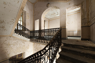 Abandoned staircase and hidden creepy hand