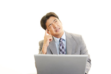 頭痛を訴えるビジネスマン