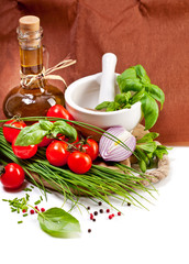Cherry Tomatoes, chives and peppers on white