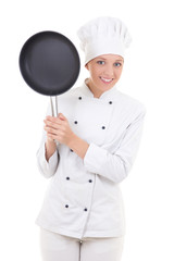 happy young woman in chef uniform with frying pan isolated on wh