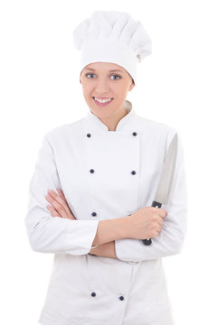 young happy woman in chef uniform holding knife isolated on whit