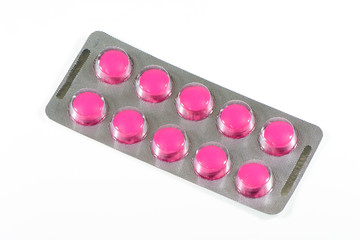 pack of pills on white background