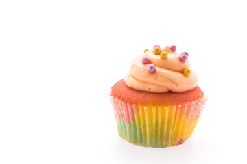 Colorful cupcakes isolated on white