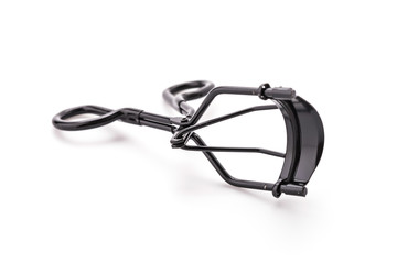 Black eyelash curler isolated on white