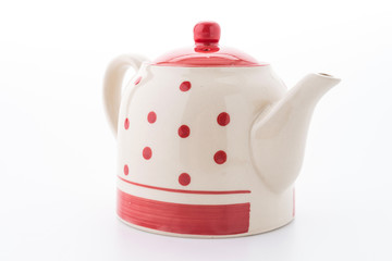 Polka dot tea pot isolated on white background