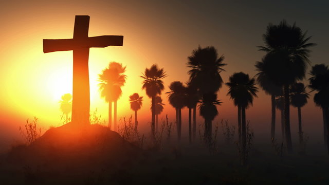 cross silhouette with palms and glowing sun