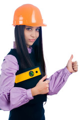 Attractive girl with level shows thumb up gesture
