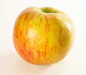 Sweet red apple on white background