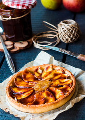 apple tart on a sand base with pear jam and caramel