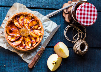 apple tart with pear jam and caramel, top view