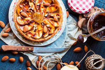 tart with pear jam, apples and caramel