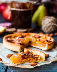 slice of tart with pear jam, apples and caramel