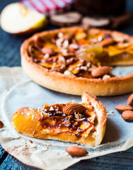 slice of tart with pear jam, apples and caramel