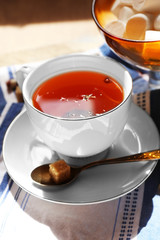 Cup of tea on table, close up