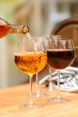 Wine pouring into wine glass, close-up
