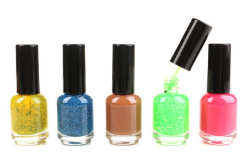 Colorful nail polishes isolated on white