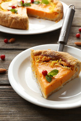 Homemade pumpkin pie on table