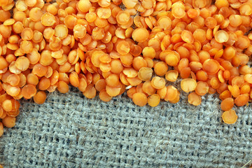 Lentil on sackcloth background
