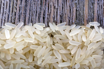Rice on wooden background