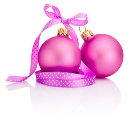Two Pink Christmas balls with ribbon bow Isolated on white backg