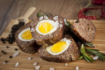 Baked meatloaf with boiled eggs for Easter