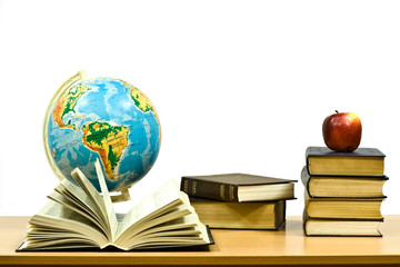 exposed books and apple