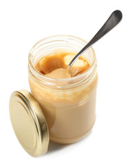 Creamy peanut butter in jar, isolated on white
