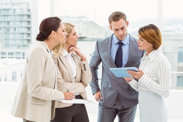 Colleagues in meeting at office