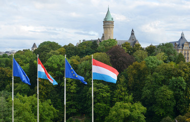 Luxemburg town with different flags, european flag and flag of Luxemburg, Europe