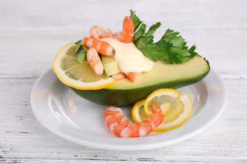 Tasty salad with shrimps and avocado