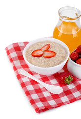 Tasty oatmeal with berries and juice isolated on white