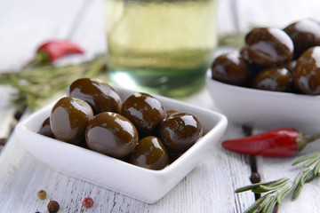 Marinated olives on table close-up
