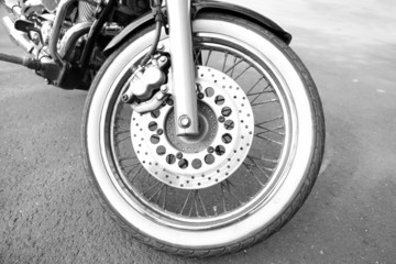 Motorcycle forks and tire, close-up