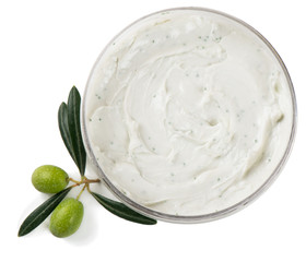 white cosmetic cream with green olives