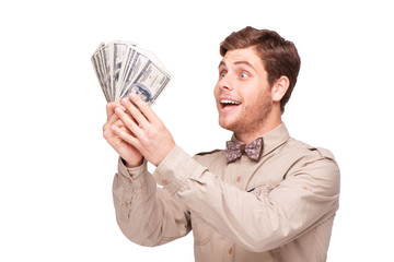 Cheerful young man with soft money