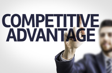 Business man pointing the text: Competitive Advantage