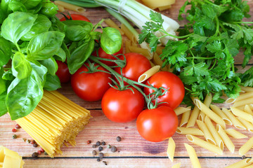 uncooked pasta and fresh vegetables