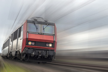Obraz premium passenger train with speed effect and copyspace