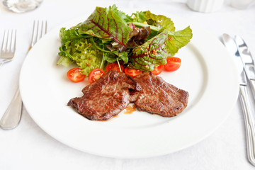 hot salad with roast beef and lettuce