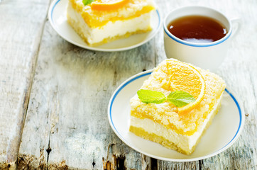 cake with orange, cream cheese and crumbs