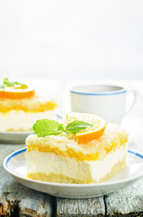 cake with orange, cream cheese and crumbs