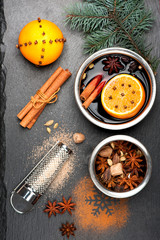 Christmas mulled wine with spices on chalkboard