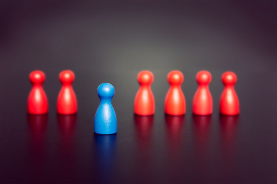 Stand out and be unique - leadership business concept with game