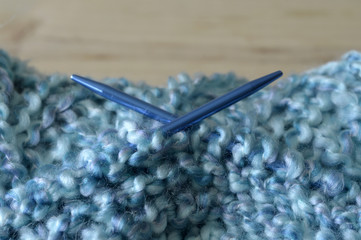 Yarn knitting needles.