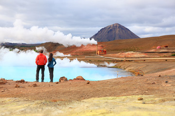 Iceland travel people by geothermal power plant