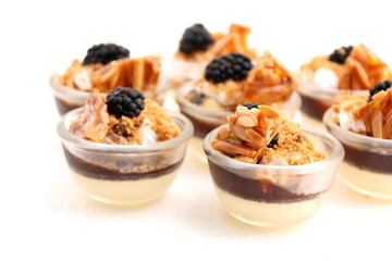 mini desserts on white