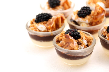 mini desserts on white