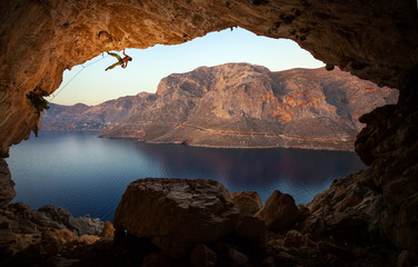 Fototapeta na wymiar Male rock climber on a cliff in a cave at Kalymnos, Greece