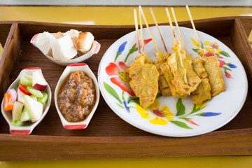 grilled pork satay and peanut sauce, thai food
