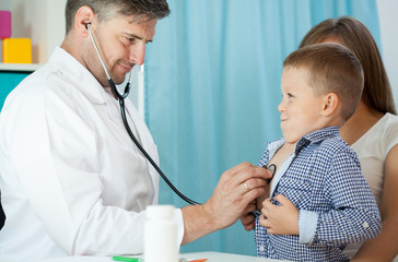 Pediatrist examinate patient with stethoscope